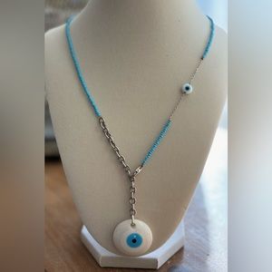 A handmade piece. Blue evil eye necklace for women or teens.